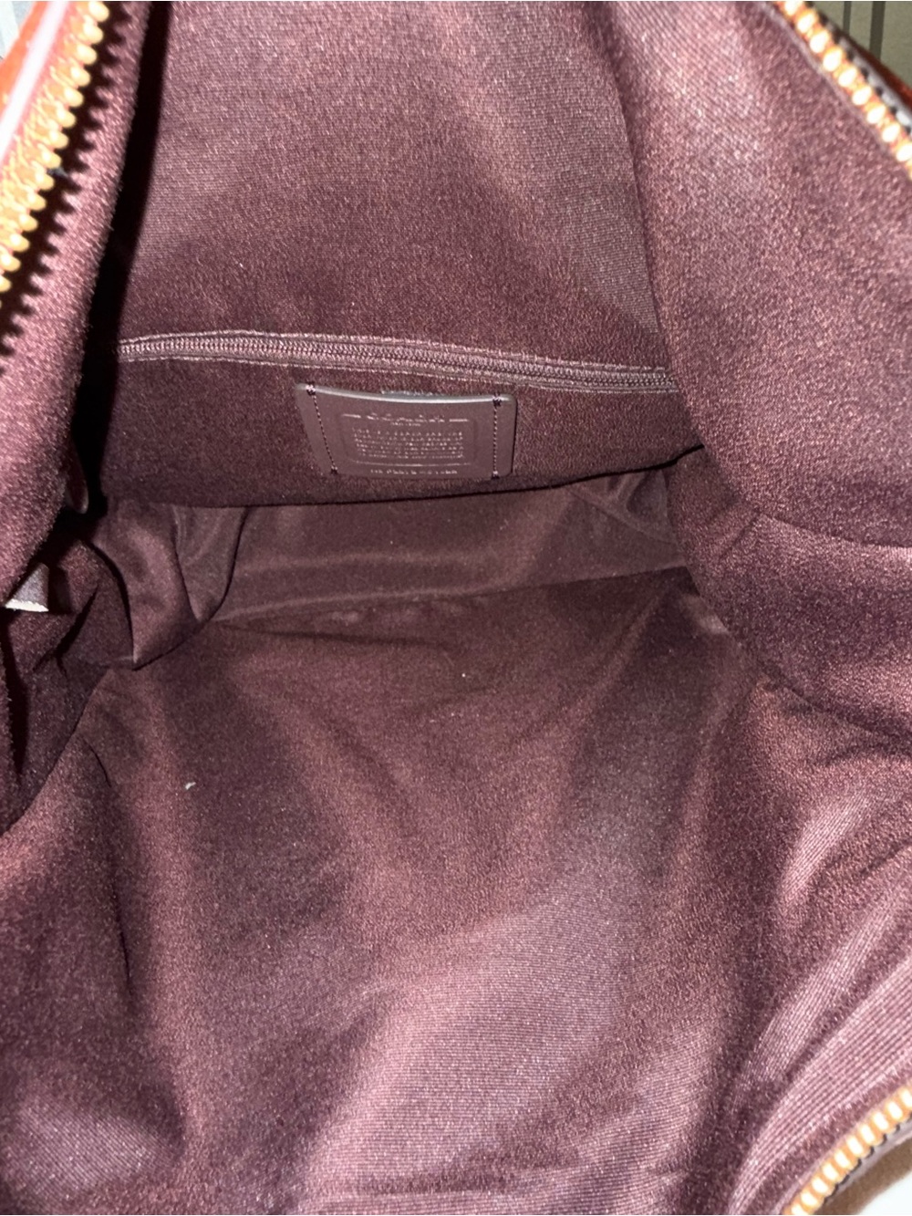 Coach Pennie Shoulder Bag features gold hardware and side suede pockets - Picture 11 of 15